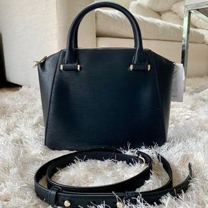 cala bow detail small leather tote bag